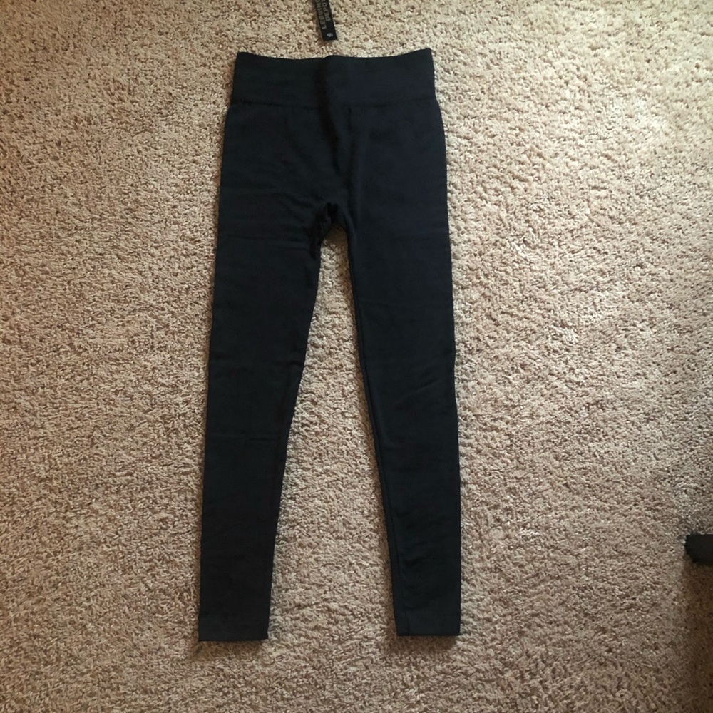 Black fleece lined fashion leggings.
